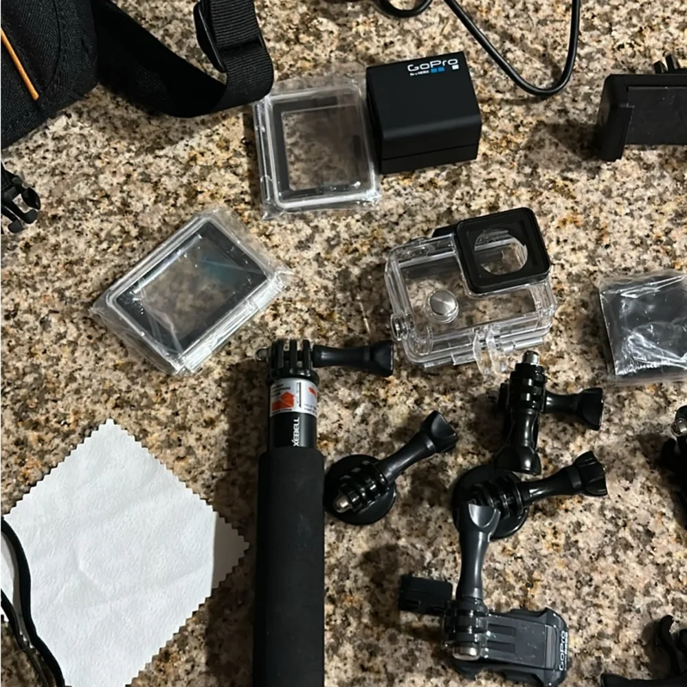 GoPro HERO4 Silver and Accessories Bundle - Black & Silver
